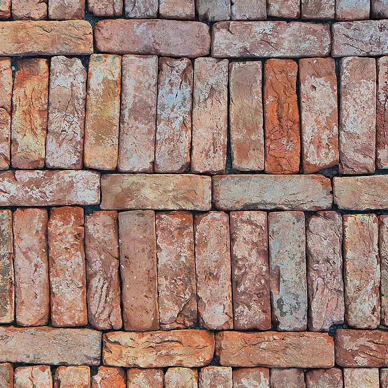 Brique en terre cuite vieillie en pose échelle